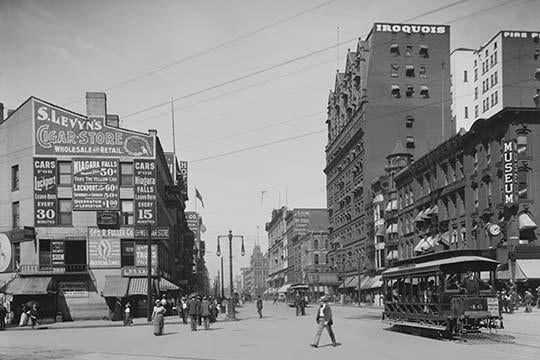 Trolleys & Pedestrians on Main Street in Buffalo, New York Poster Print