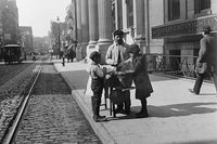 Boys Buying Peanuts from Street Vendor on 42nd Street NYC Poster Print