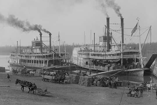 Two Steamboats Along the Levee at the Mississippi River Poster Print