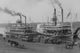 Two Steamboats Along the Levee at the Mississippi River Poster Print