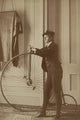 Frances Benjamin Johnston full-length self-portrait poster print featuring a woman dressed as a man with a penny farthing bicycle.