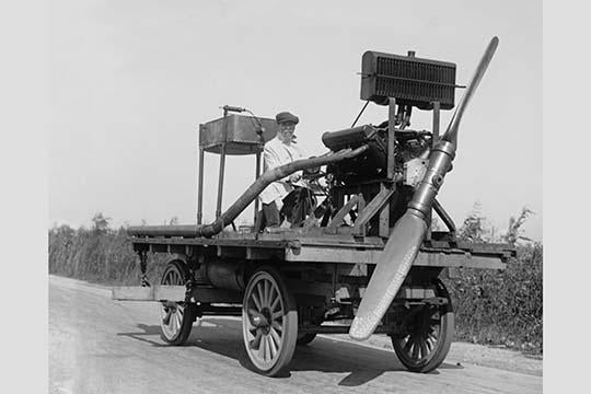 Wheeled Vehicle with Mounted Propeller Poster Print showcasing innovative design.