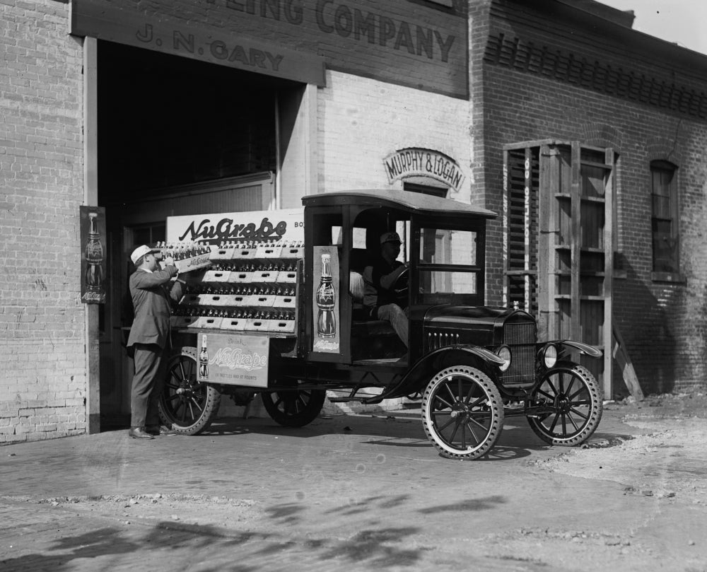 Loading Bottles of Grape Pop for Delivery Poster Print