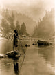 Hupa Man with Spear Poster Print featuring a man on a rock with foggy mountains in the background.
