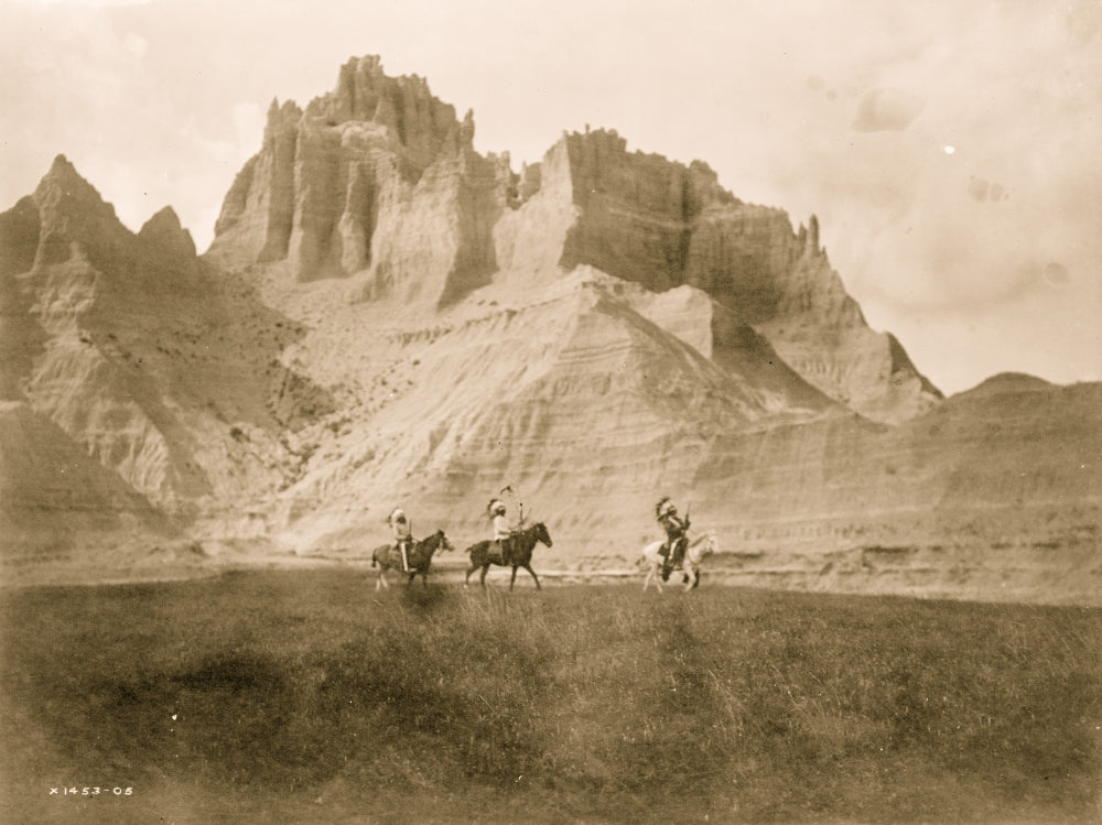 Entering the Bad Lands poster print featuring Sioux Indians on horseback.