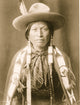 Half-Length Portrait of Jicarilla Man Poster Print showcasing Native American culture.