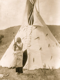 Dakota man standing outside tipi gazing upward poster print.