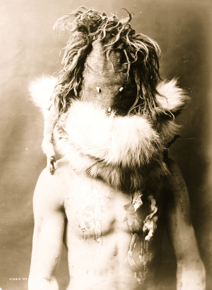 Indian half-length portrait poster print featuring a dark mask and fur ruff.