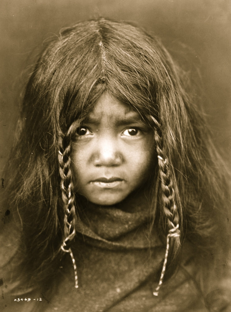 Head-and-shoulders portrait of a child poster print.