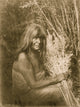 Maricopa Indian portrait print featuring a seated figure holding arrow-brush stalks.