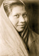Bust portrait of a Quileute woman facing right, poster print