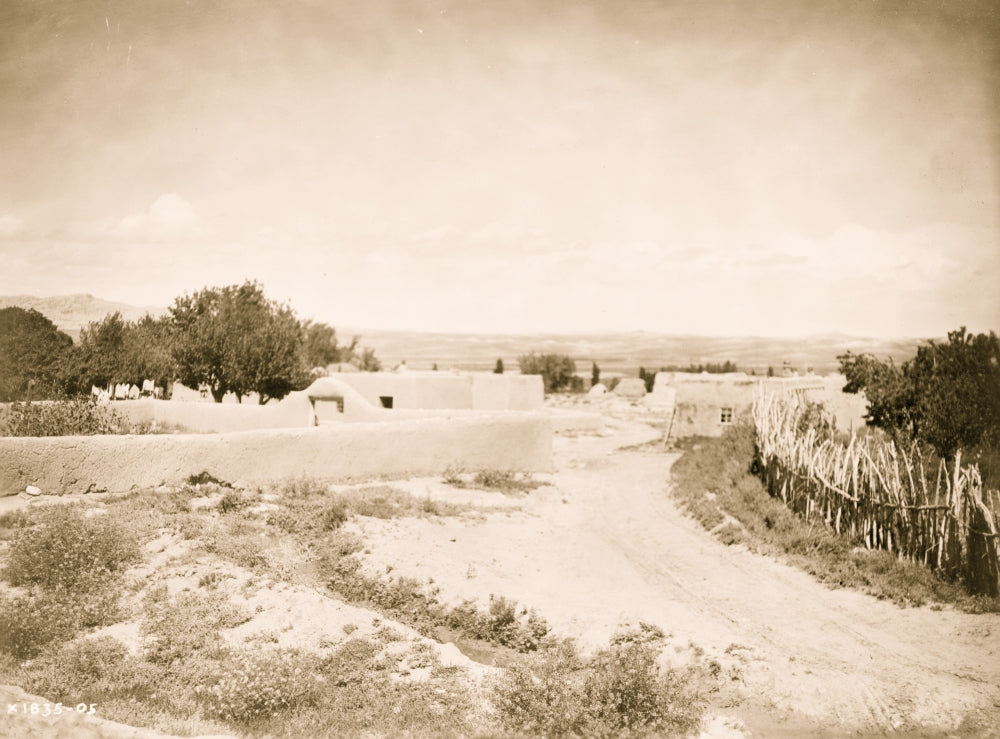 View of Pojoaque Pueblo poster print showcasing adobe structures in New Mexico.