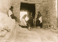 Four young Hopi women gathered outside an entrance poster print
