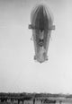 Blimp, Zeppelin No. 3 in shed, viewed from water - poster print