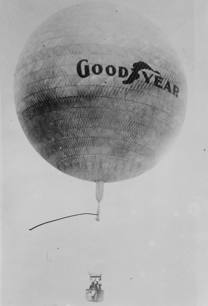 Good Year Balloon Poster Print showcasing colorful balloons against a clear sky.