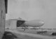 Navy Dirigible Poster Print showcasing a vintage dirigible on a navy background.