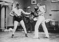 Sparring Boxers Poster Print featuring heavyweight champions in action.