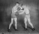 Knockout Brown and Sparring Partner Poster Print showcasing a dynamic boxing scene.