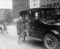 A Woman Driver Holding a Taxi Door Poster Print