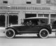 Automobile Outside Reynolds & Sons Auto Builders Poster Print