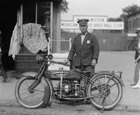 Policeman with Harley Davidson Motorcycle Poster Print