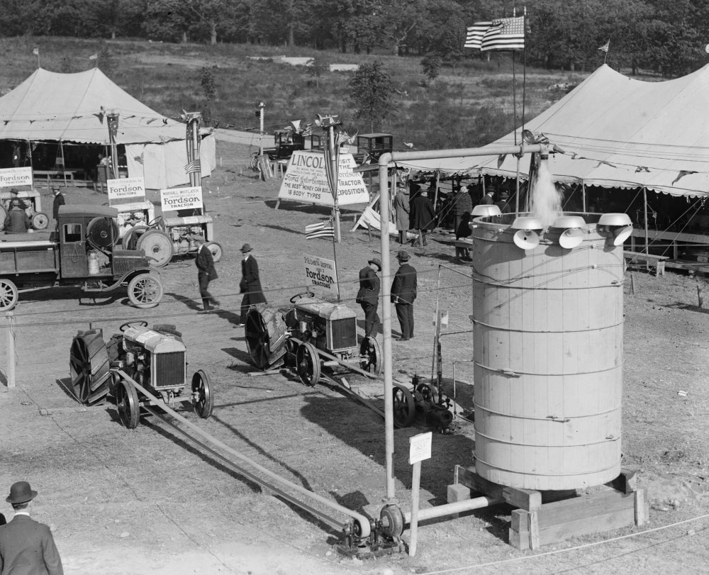 Fordson Tractors on display at an open-air exhibition poster print