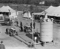 Fordson Tractors on display at an open-air exhibition poster print