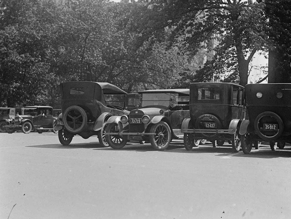 Vehicles Parked in Street Scene 1925 Poster Print