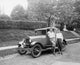 Boys Standing Next to a Coupe Poster Print on premium paper