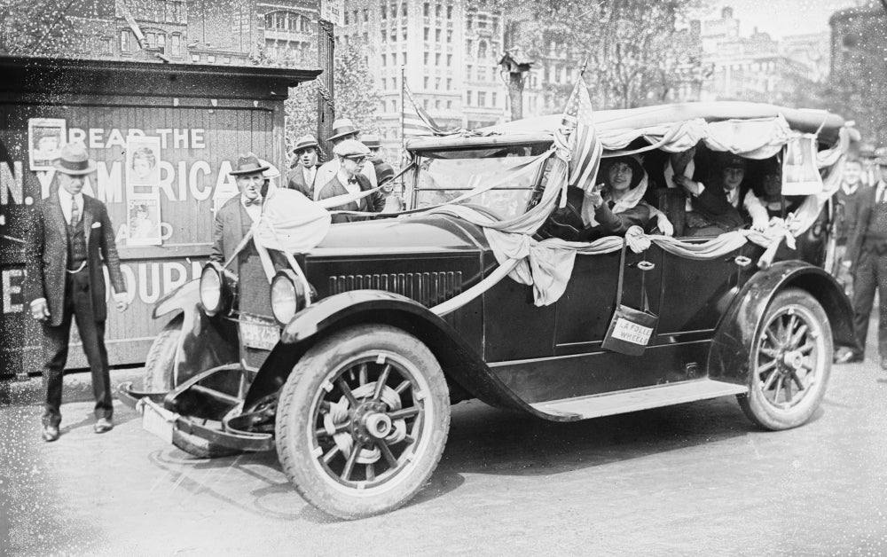 Woman's Suffrage Car Driven by an Activist Poster Print, celebrating women's rights activism.