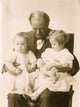 W.J. Bryan holding two grandchildren on his lap poster print.