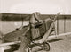 Lindley Working on Plane Engine Poster Print showcasing aircraft engineering.