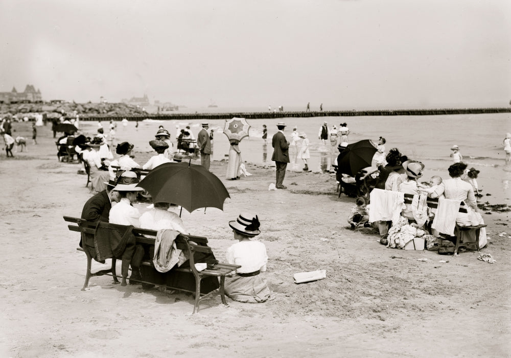 On the Beach at Coney Island Poster Print showcasing a vibrant beach scene.