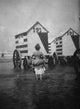 Bathing Booths at Ostend Belgium Poster Print featuring a woman bather lifting her dress.