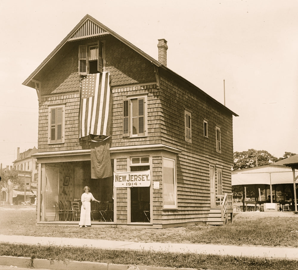 House with Flag in Asburg Park Poster Print showcasing a picturesque scene with an American flag.