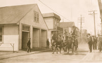 Firefighters racing to a fire with horses poster print