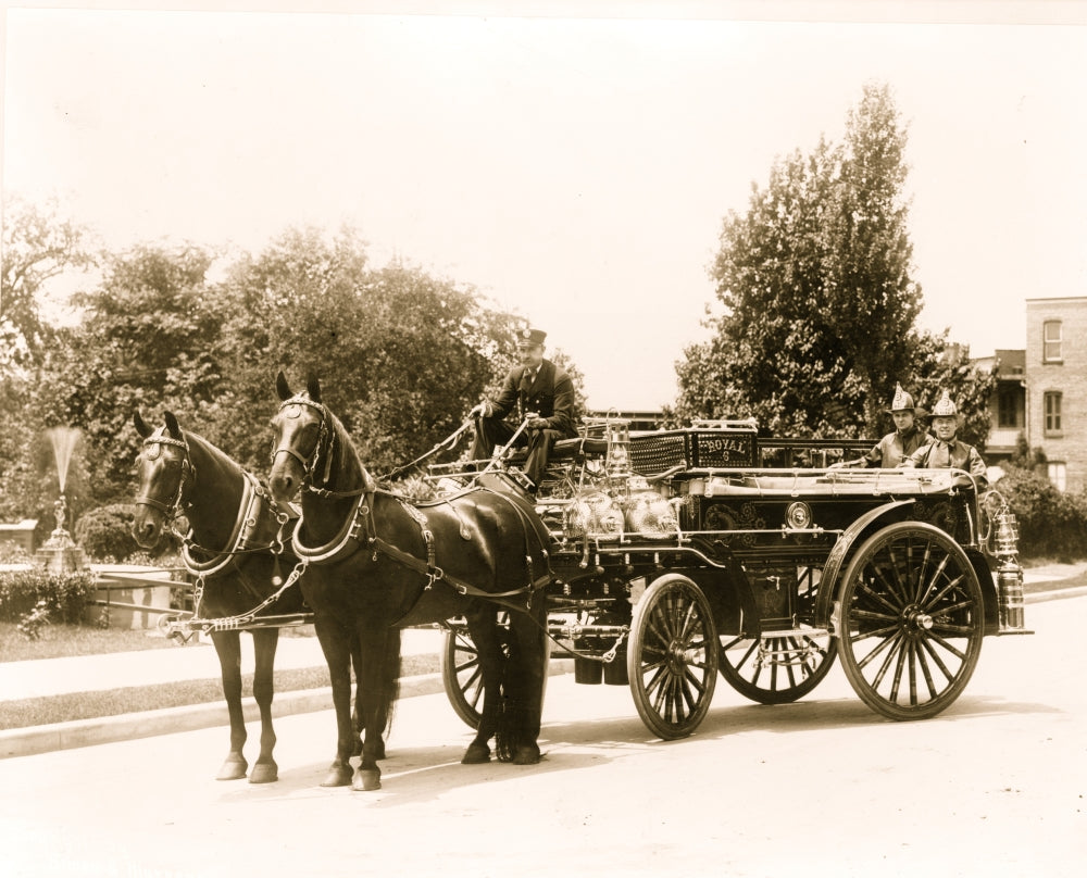 Stationary fire engine drawn by two horses poster print