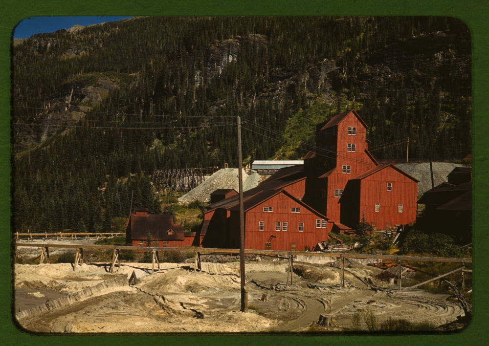 Red Mill Building Poster Print showcasing a scenic hill view