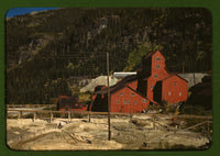 Red Mill Building Poster Print showcasing a scenic hill view