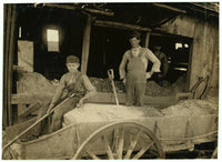 A Boy Shoveling Ore at Daisy Bell Mine Poster Print
