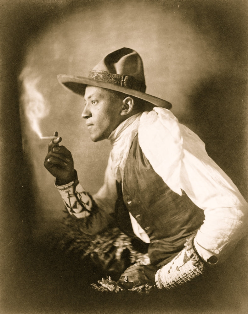 Sioux Indian Smoking Cigarette Poster Print showcasing Native American culture.
