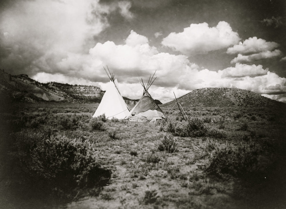 Encampment of Tepees Poster Print showcasing traditional tepees in nature.