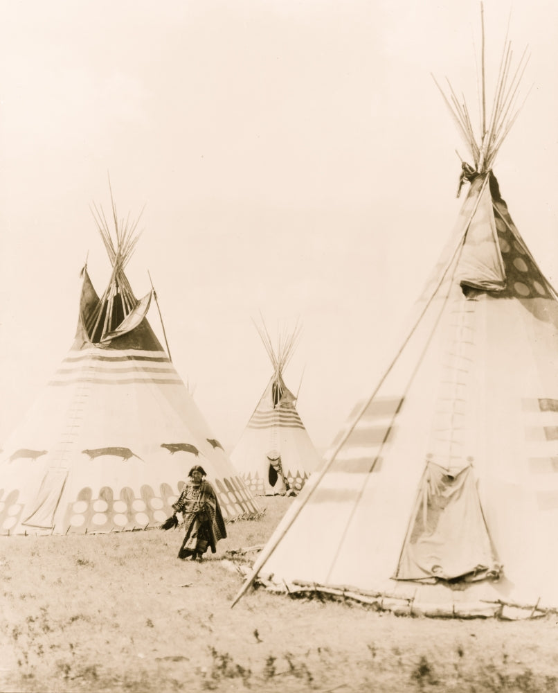 Woman walking among painted tipis poster print