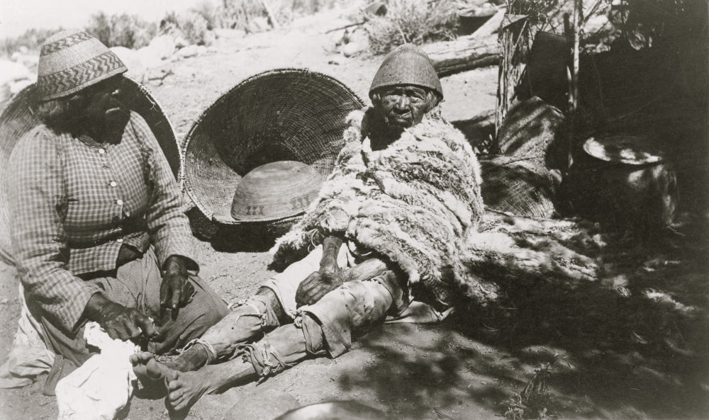 Poster print of two old Paiute Indian women with baskets and woven hats