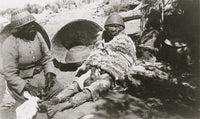 Poster print of two old Paiute Indian women with baskets and woven hats