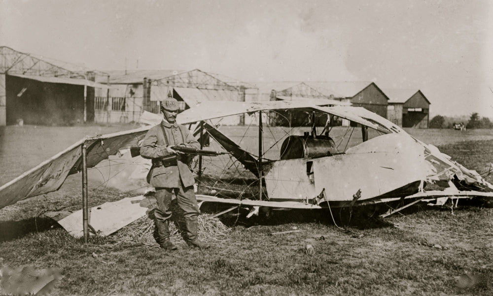 German Guarding Wrecked Plane Poster Print showcasing a historical aviation scene.