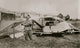 German Guarding Wrecked Plane Poster Print showcasing a historical aviation scene.