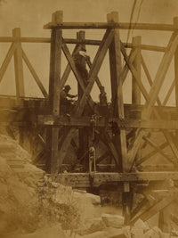 Military Railroad Operations in Northern Virginia Poster Print showing men working on bridge trestles.