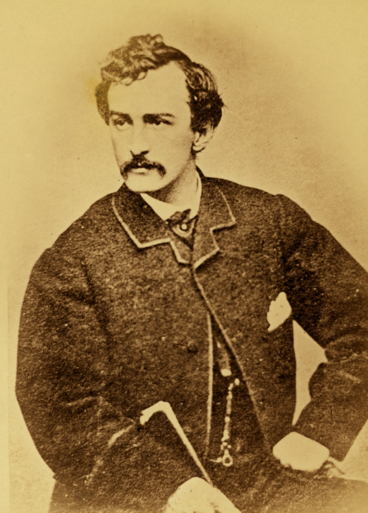 John Wilkes Booth half-length portrait poster print showing him facing left with a cane.