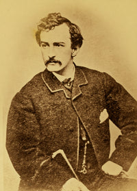 John Wilkes Booth half-length portrait poster print showing him facing left with a cane.